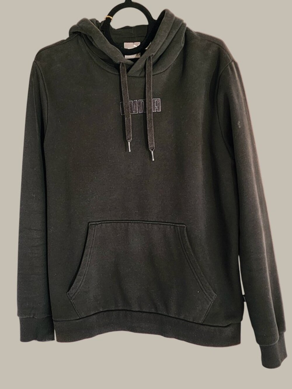 Hoodie Medium  ChatGPT said: Puma Cotton Fleece Hoodie – Black, Size Medium